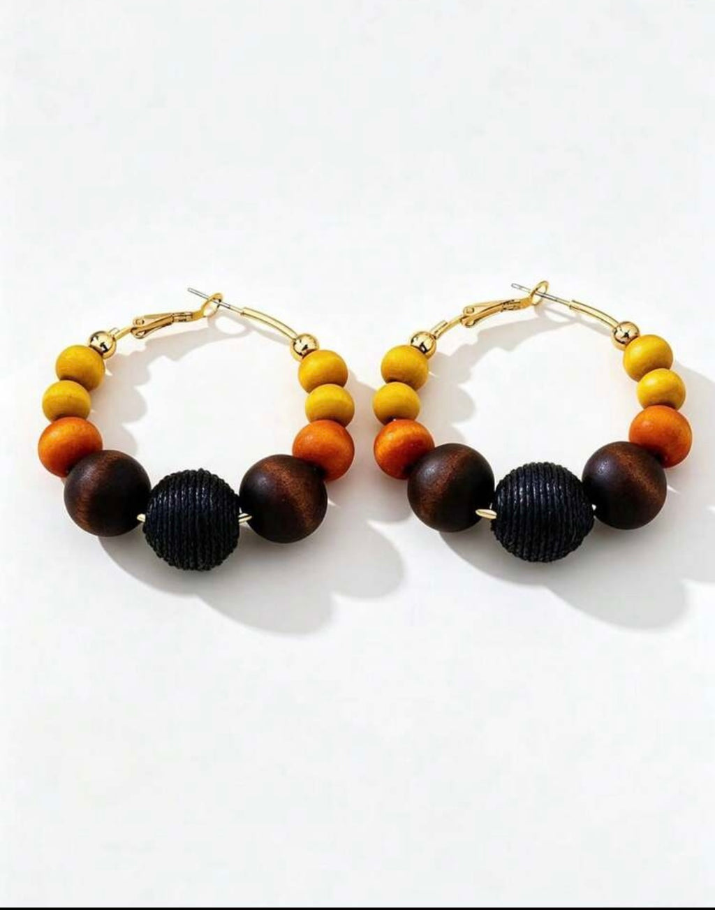 Boucles d'oreilles créoles à la mode