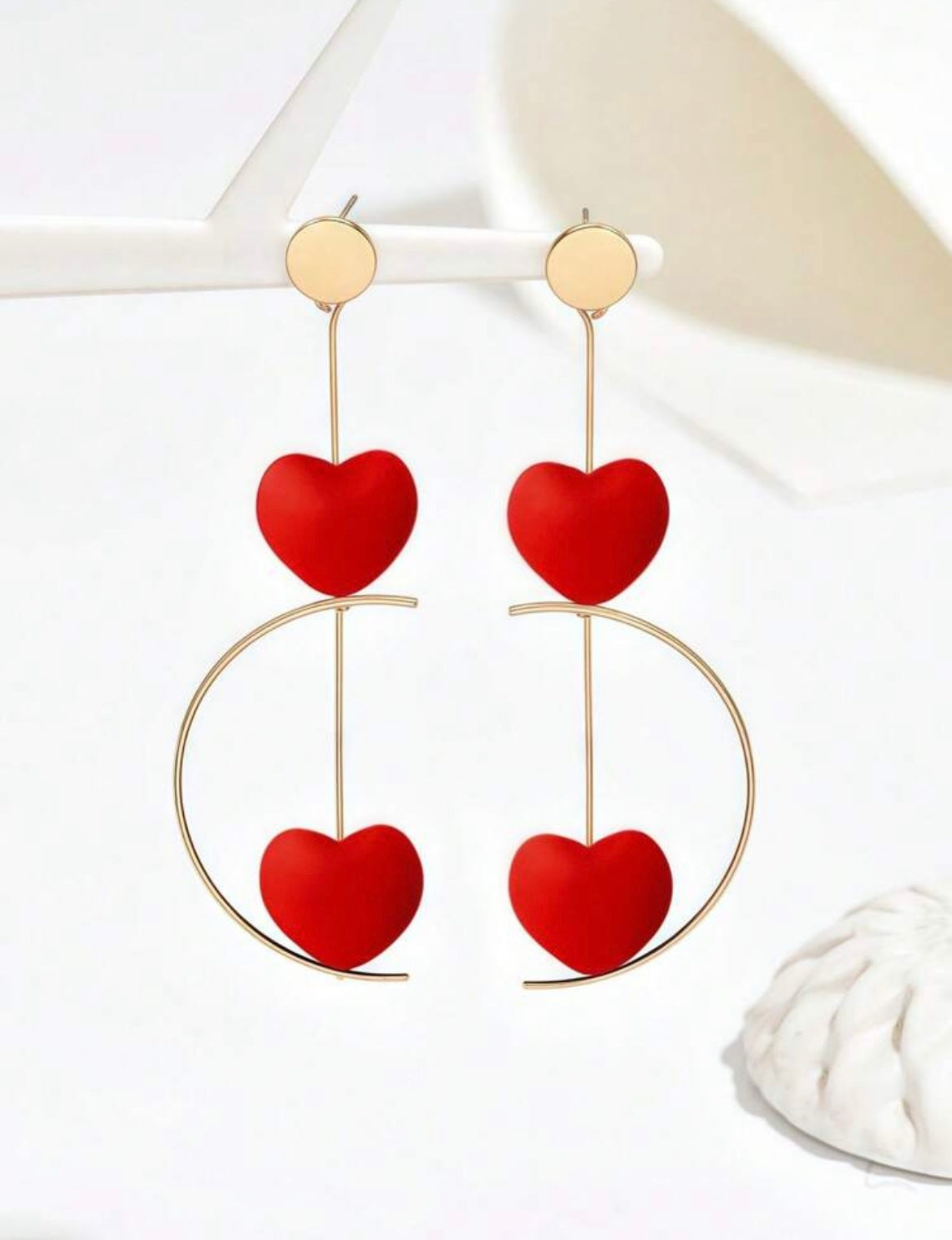 Boucles d'oreilles géométriques longues et rotatives