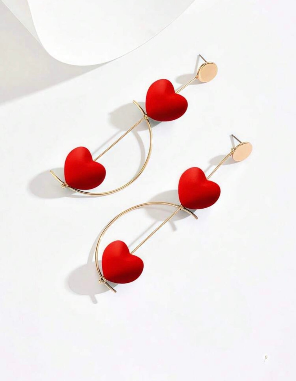 Boucles d'oreilles géométriques longues et rotatives